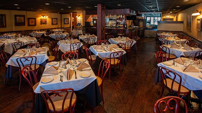 Dining room with many set tables